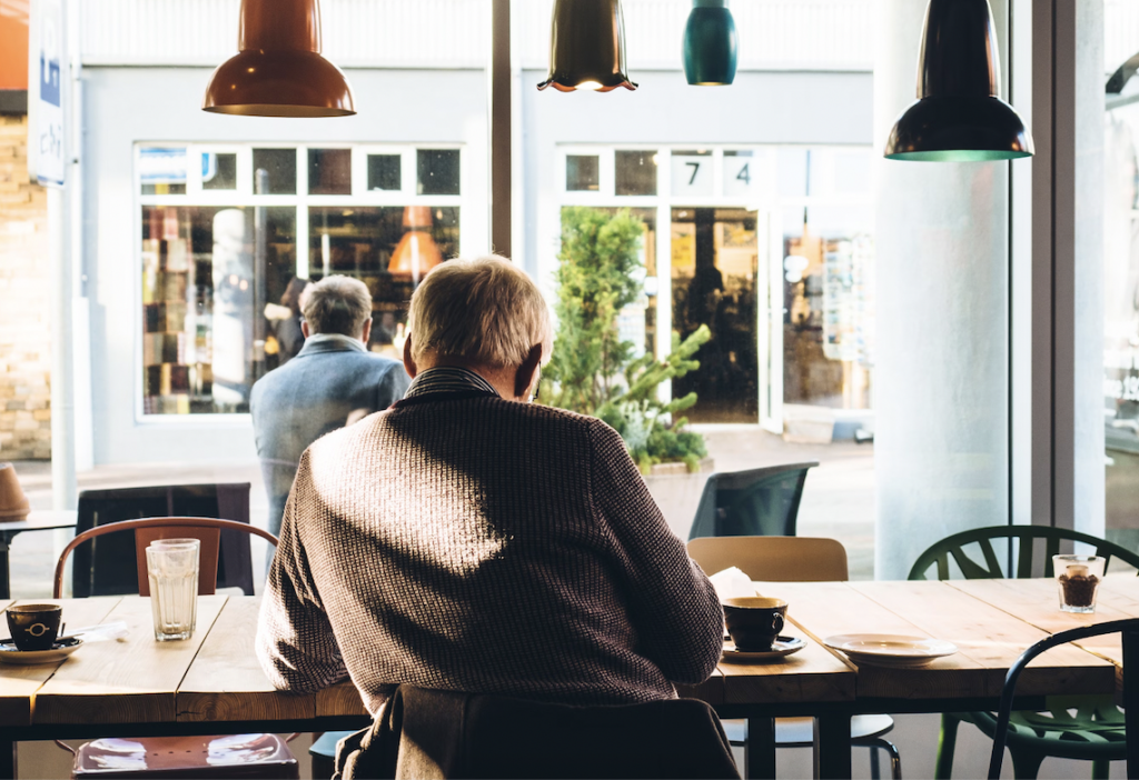 Picture of man at coffee shop.